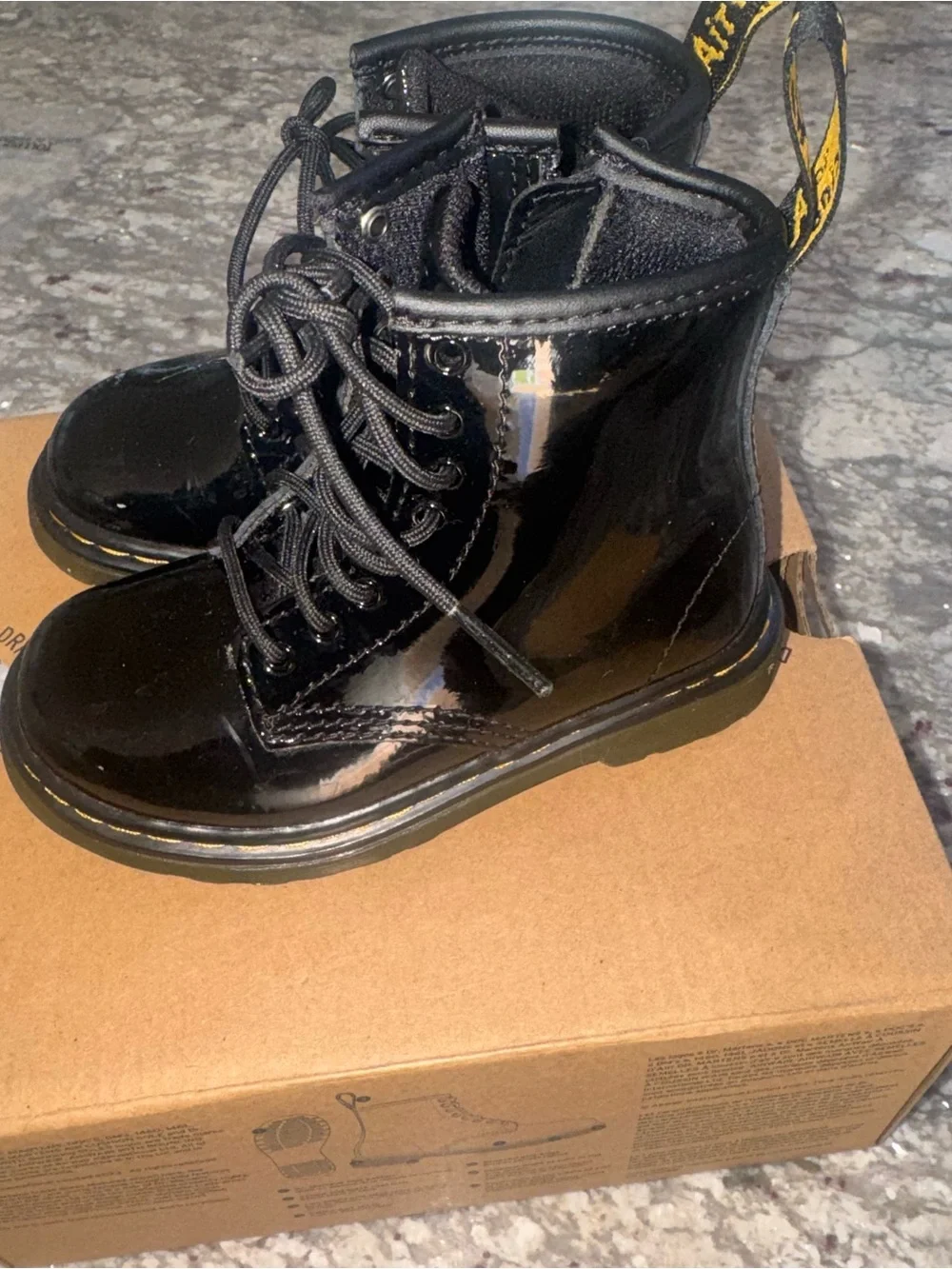 Like new Dr. Martens Black Patent Kids Lace-Up Boots with Yellow Stitching